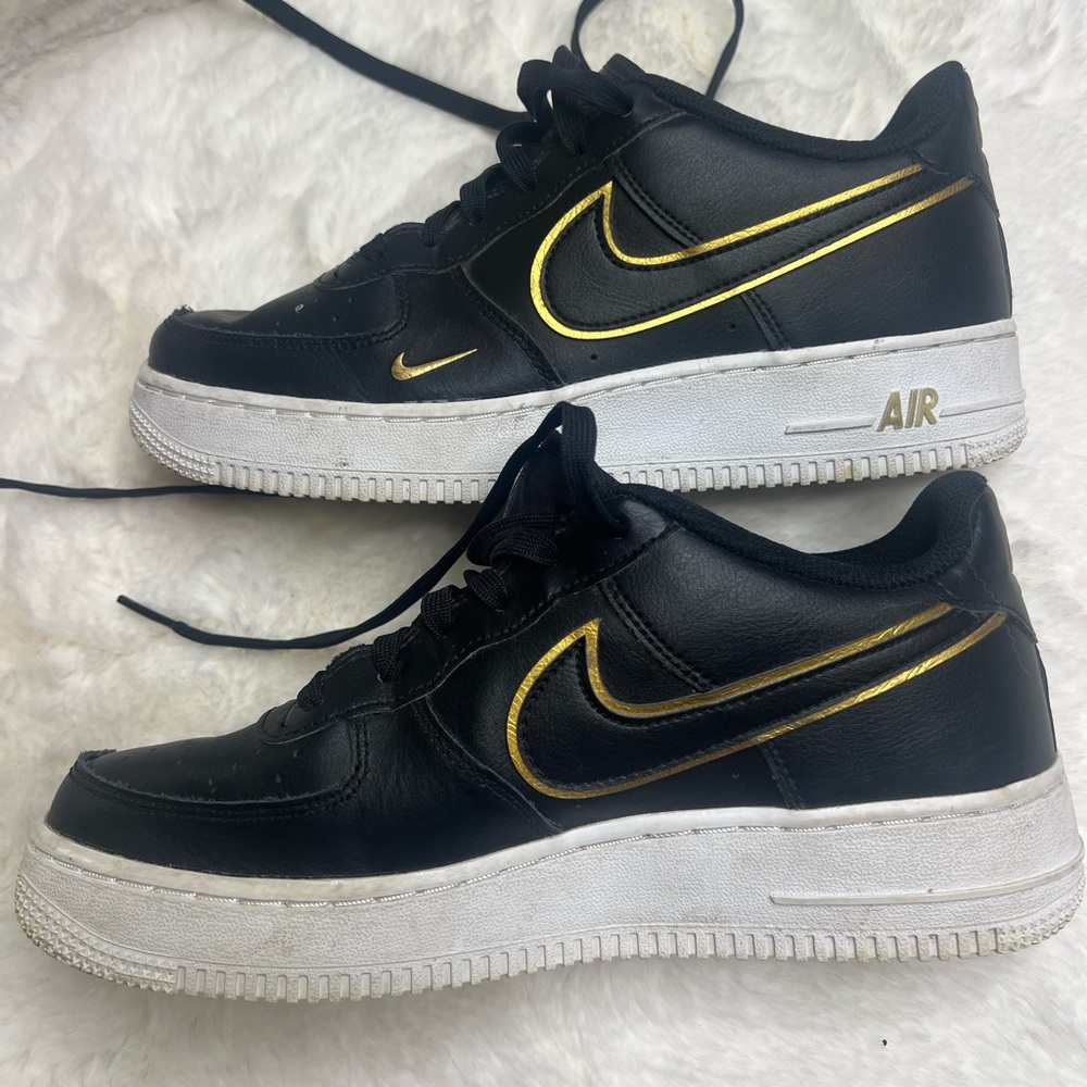 Size 7 Nike Air Force 1 black gold